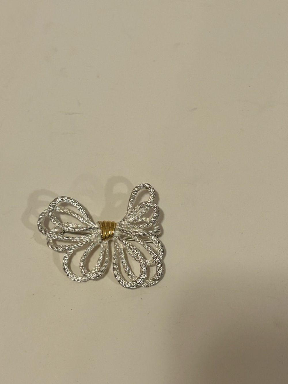 Silver tone Bow Statement Brooch with Gold tone Accent